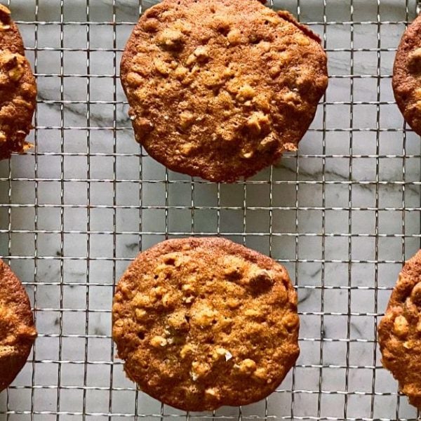pumpkin cookies on a cookie sheet